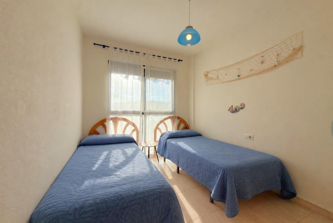 Dúplex en la playa de Gandía con terraza privada, garaje y licencia turística